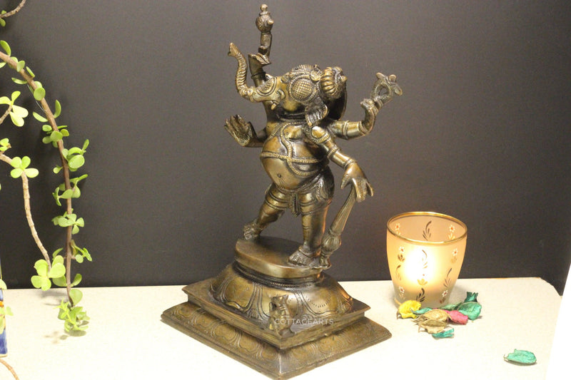 Four Hand Ganesha Statue 11" Bronze Finish